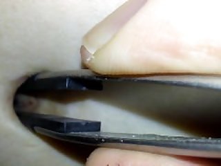Tweezers in my belly button, how deep does