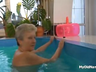 Horny granny in the pool