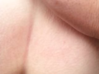 Bent over a rock in the mountains