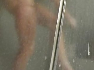 Spying on my mature mom taking a shower