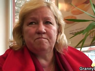 Young guy picks up huge old grandma in