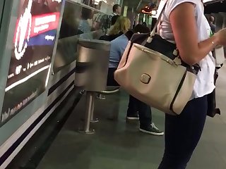 Woman in tight jeans and sexy ankle boots