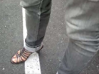 My wife's feet in silver sandals