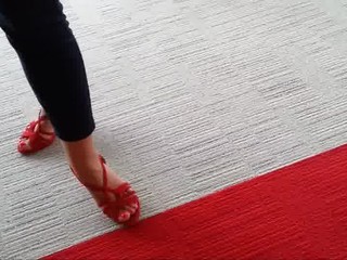Friend's feet in red heels 1
