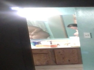 a mature getting out of the shower voyeur